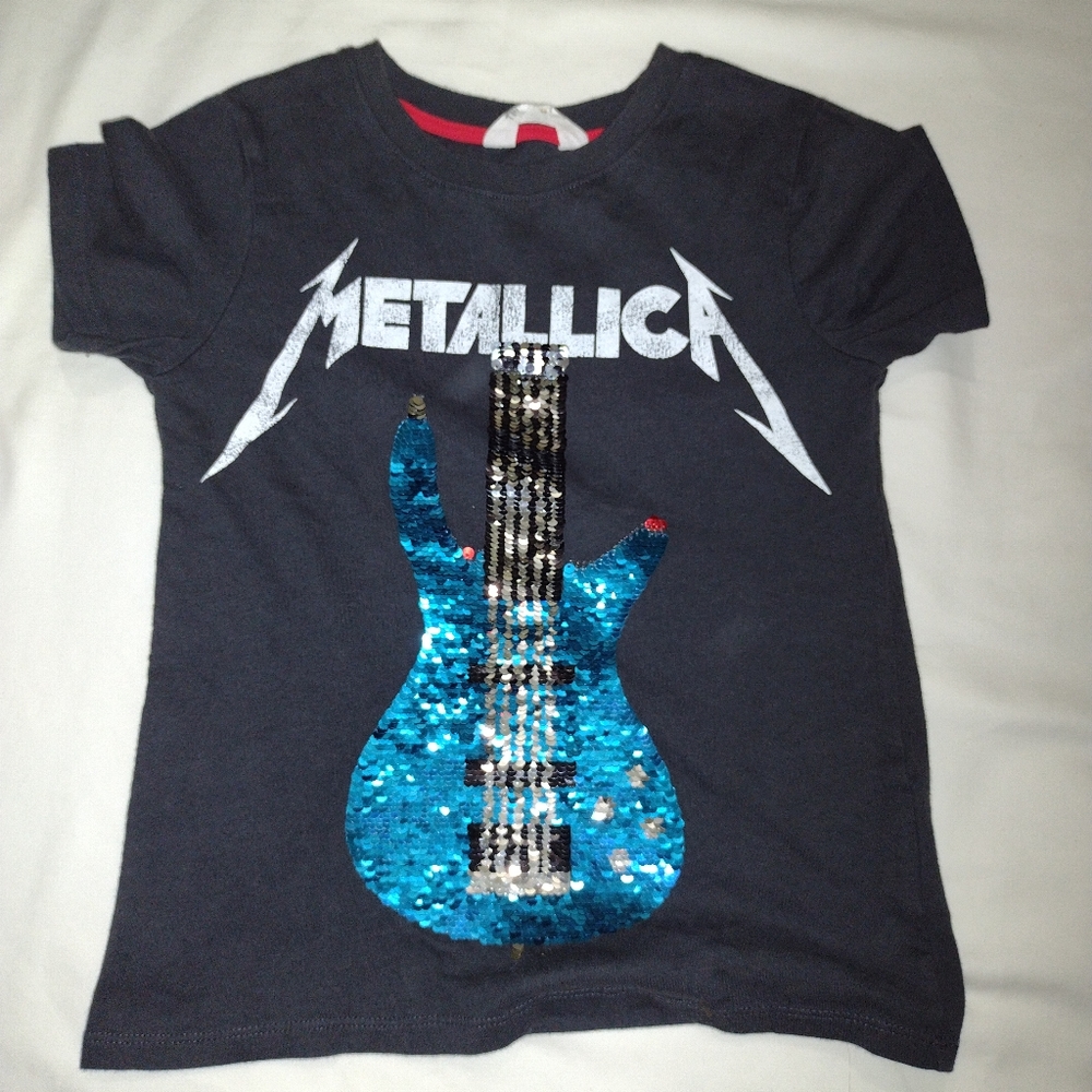 Short sleeved sequin T-shirt from H&M size 6-8 Y Used in good condition